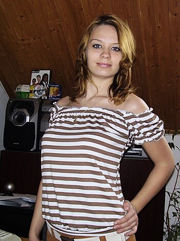 Here's an image of some bitch with a stripy t-shirt.