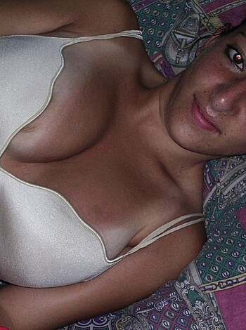 "Check out this hot chick fuckin' bustin' outta her bra on the couch, bro."