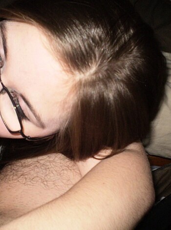 "This picture depicts an unrestrained chick sucking cock."