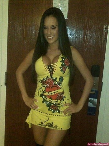 "Here's a pic of a chick in a flouncy, flower-patterned yellow dress that barely covers her tits."