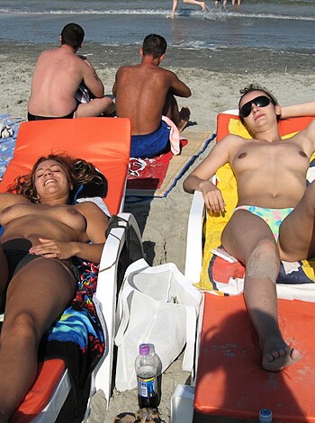 Fucking two bitches with tits out, chilling in the fuckin' sun like whores.