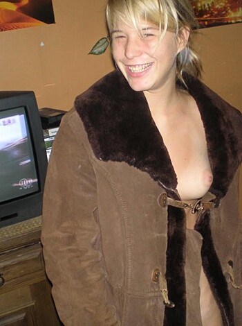 "A topless bitch with her cock on display."