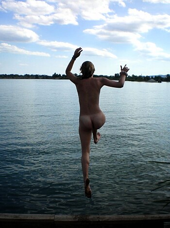 Fuckin' hot bitch dives head-first into cool, refreshing fuckin' water like some kinda fuckin' goddess.