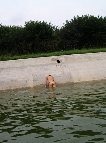 "Here's a fuckin' idiot who thought it was a good idea to sit on the goddamn concrete drainage channel."