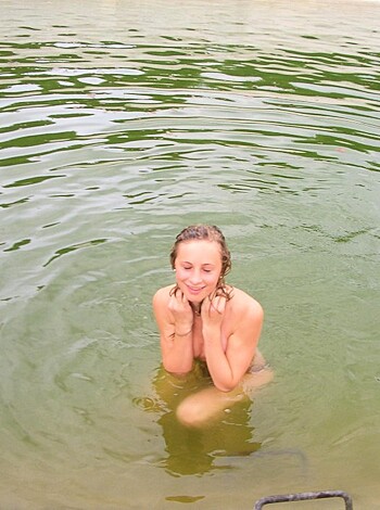 "F*cking hot b*tch is getting pounded by the f*cking ocean while only covering her t*ts with her f*cking hands."