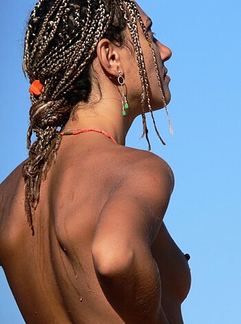 "Bikini-clad bitch with braids, lookin' left."