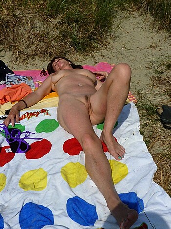 "Gazing at her tits and cunt as she basked in the sand, with nothing but a small towel covering her skin."