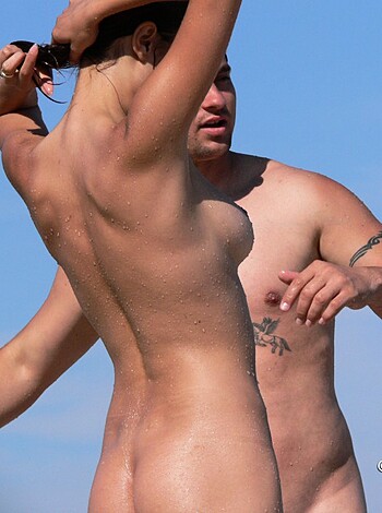 "Thick necked, tatted-up dude with his shirt off, balls deep in some smoking hot chick on the sand."
