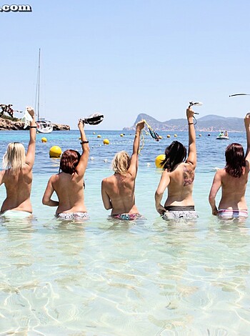 A group of slutty bitches getting their tits and asses wet in the fucking sea.