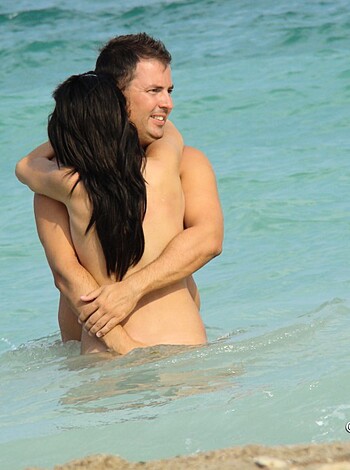 Fucking two nude bitches humping in fuckin' ocean, asshole!