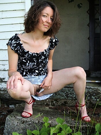 """
Check out this bitch's fuckin' pussy and ass, gettin' all slutty for the camera. 
"""