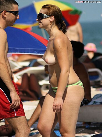 Vulgar Description:
Yo, check out this hot ass chick with tits hangin' out her top and pussy drippin' from her bikini bottom. Fuck yeah!