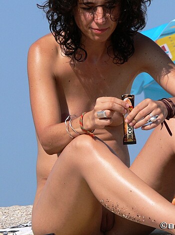 "Hey asshole, look at this fucking hot bitch with no top on at the goddamn beach."