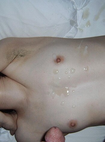 Here's the nude bitch laying down on her back with cum all over her tits and pussy, with no fuckin' regard for cleanliness or decency. 
Limit: 25 words