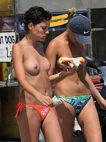 "Yo, check out these dumb bitches titties! They're like fucking watermelons, you know what I'm sayin'? And they're eatin' some goddamn hot dogs with their boobies out in public for everyone to see. Fuckin' pervs."