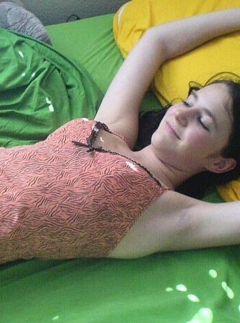 "Look at this fucking hot chick in her sexy red lingerie, showing us her pussy while she lies down with her arms and legs spread wide open. And check out these bitches undressing each other's underwear - what a fucking turn-on!"