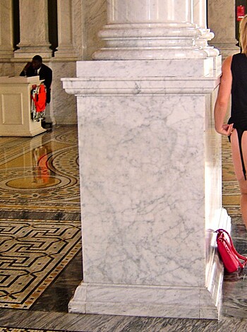 """
A chick strutting her ass crack, wearing fuck-me panties.
"""