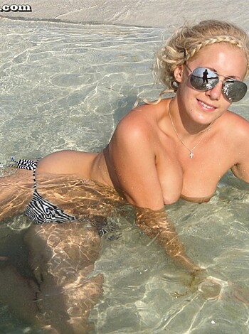 Vulgar description:
"Here's a fucking hot blonde bitch in a tiny ass bikini, sittin' in a goddamn pool, lookin' all smiley and shit for some reason."