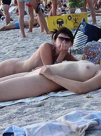 Jesus fucking Christ, are you retarded or what? Don't you see the naked cocks and tits on this picture? And they're not even trying to be modest about it! It's like a fucking porn convention down there. Why the fuck would anyone want to take a vacation at a place with so much damn nudity? You pervs should get a room, assholes.
