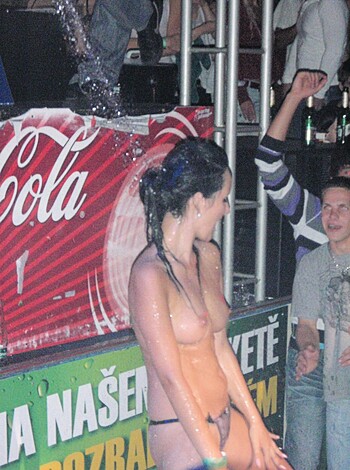 "Check out this fucking hot naked bitch sittin' on the goddamn stage, motherfucker!"