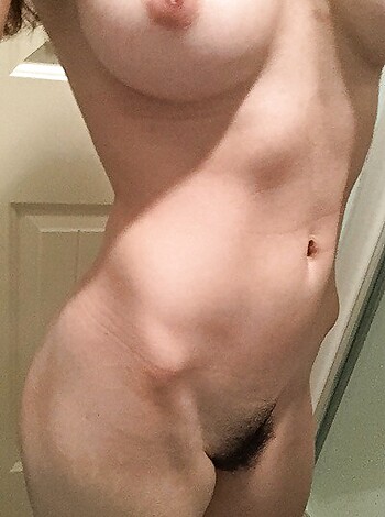 "This image is of a fucking hairy cunt nude chick with shaggy pussy."