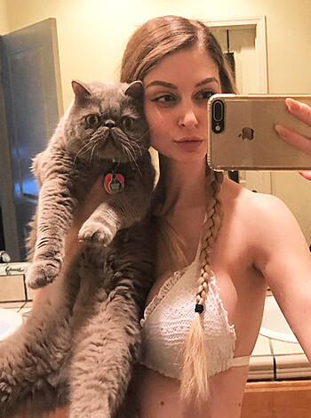 "F**k off, you f*cking prude, this ain't no 'mirror selfie,' bitch-ass motherf*cker! It's a goddamn #selfie with my damn cat, you c*nt!"