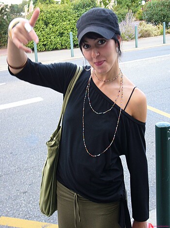 Vulgar Description:
This fucking image shows some bitch with her hand on her fucking cunt, goddammit.