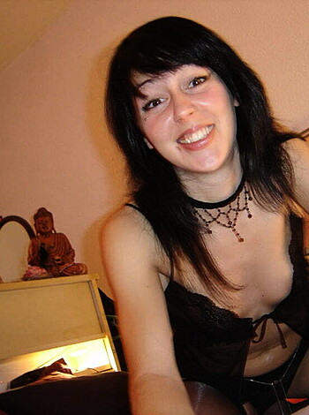 Vulgar Description: A busty slut in lacy panties flashing her fake tits for the camera.