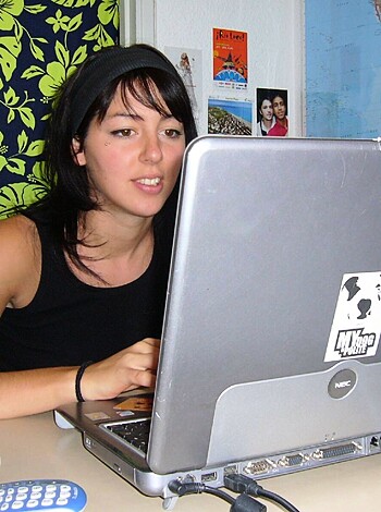 "Look at this fucking bitch typing on her goddamn laptop."
