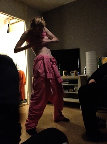 "Here's a pic of some dude in a fucking pink outfit standing in some room, with zero evidence of any sex or sexual activity being present."
