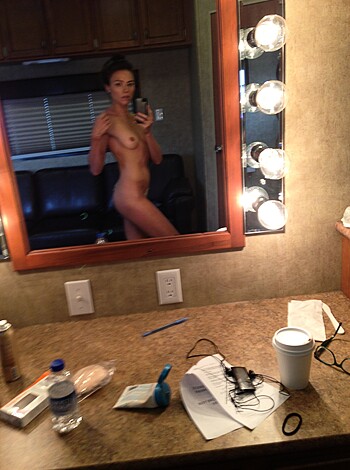 Fucking hot ass chick fucking herself with a mirror while getting her tits out, oh fuckin hell yea.