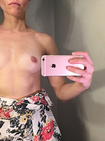 A bare tits shot of some babe.
