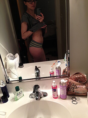"""
Hot chick posing for camera with perfect ass shot while showing off her bikini panties and bra. Fuck yeah!
"""