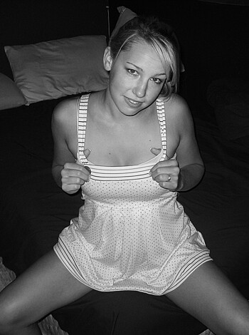 A fucking hot topless chick on some shitty bed with her juicy tits out for the world to see, damn son!