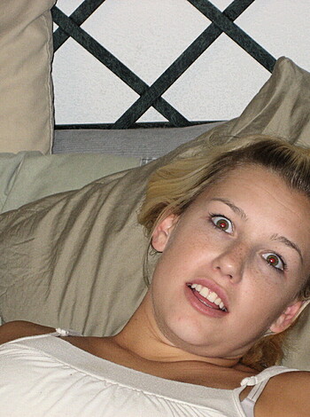 "Here's the fucking image of some chick lying on her ass with her goddamn eyes open like some retarded bitch trying to look all sexy-like while her cocksucking mouth is halfway agape like she just got done blowin' some dick or something. What a fuckin' moron."