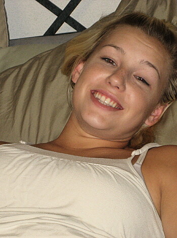Busty broad with a grin.