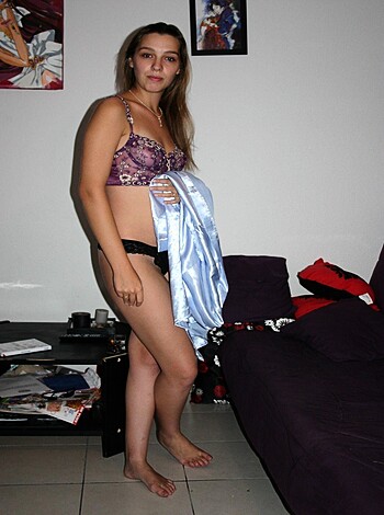 "Here's a bitch with her tits out, posin' next to a fuckin' bed."