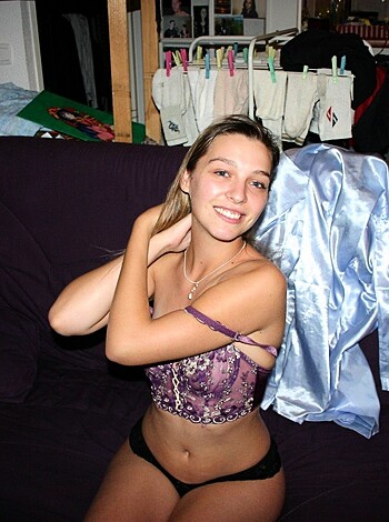 A topless bitch with just some frigging bracelets on.