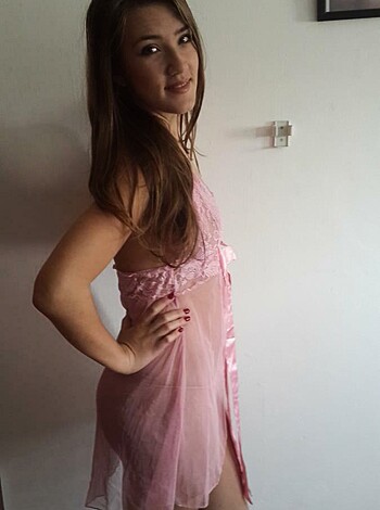 A naked babe in pink knickers fucking stretches out on her bed while taking a sexy selfie, using her phone to snap the picture and showing off those perky titties for all the world to see.