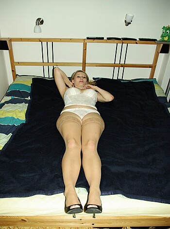 Fucking bitch lying bare assed on some fucking bed.