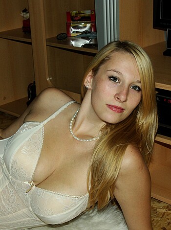 The lady is dressed in sexy underwear.