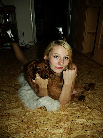 Fucking hot bitch with a fat ass gets on her back while petting her fucking puggy dog.