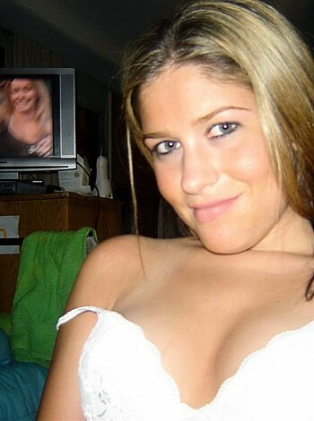 "This image depicts a busty chick in her panties standing cockeyed, flaunting her titties for all to see."