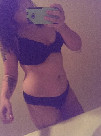 "Thick-assed whore bitch with her tits out and black fucking lace."