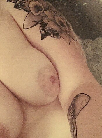 "Look at this chick, taking a dip in her own pussy juice, while exposing her fuckin' nipple and tramp stamp."
