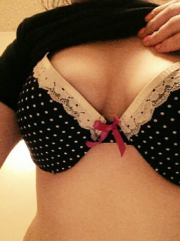 "Here's a photo of some tits. You can see her dark nipples through the sheer fabric, and her boobs are pretty fucking huge."