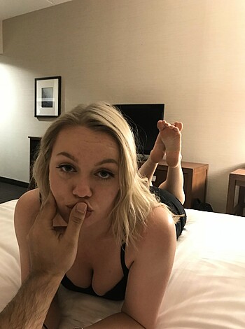 Here's a hot babe getting tongue-deep into some lip-licking action, while a lucky dude gets to make out with her schnoz.
