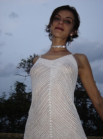 "Here's a hot babe, lookin' sexy-as-fuck in her see-through dress."