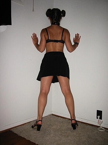 "Here's a photo of some hot chick wearin' her sexy lace underwear, standin' up agaisnt the wall like a friggin' hottie."