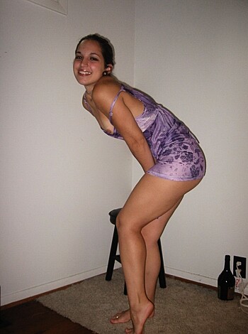 "Here's a f*cking pic of some b*tch with her ass hanging out in a shitty purple robe, standing around barefoot and leaning up against a goddamn wall."